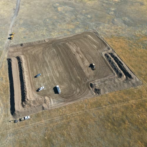 Graders completing reclamation work on a site